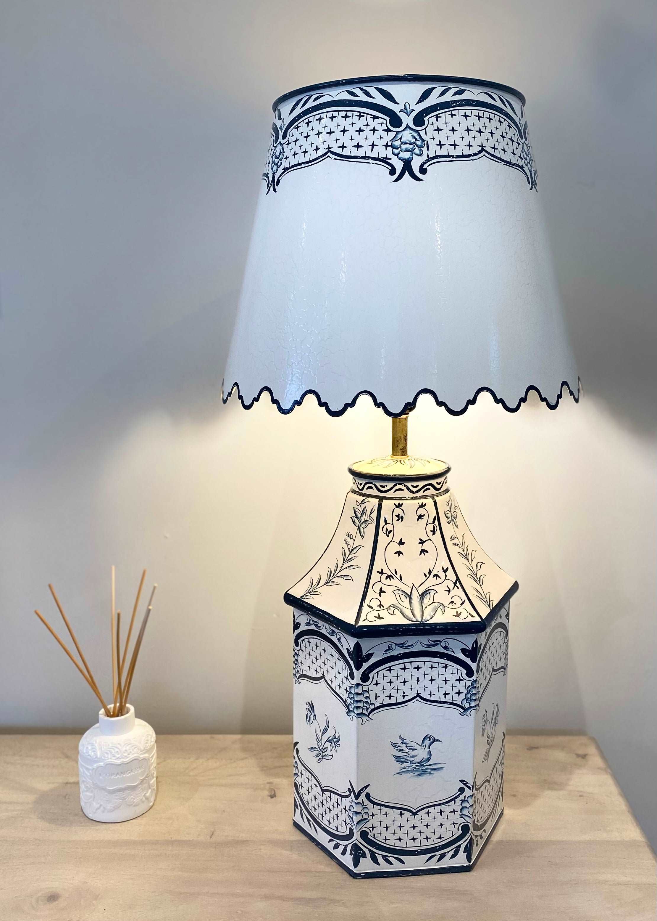 Lamp good and shade, blue lamp base with shade in a toile fabric, trim lamp