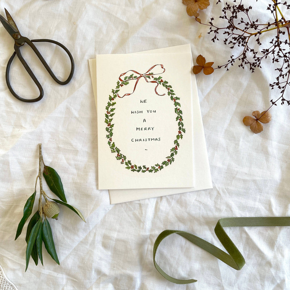 
                      
                        Holly Wreath 'We Wish You A Merry Christmas' Card
                      
                    