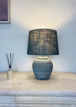 The Apollo Distressed Stone Table Lamp & Shade