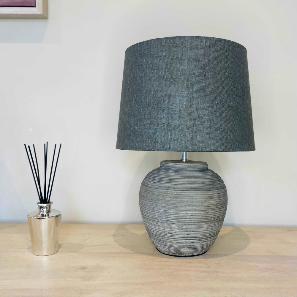 The Apollo Distressed Stone Table Lamp & Shade